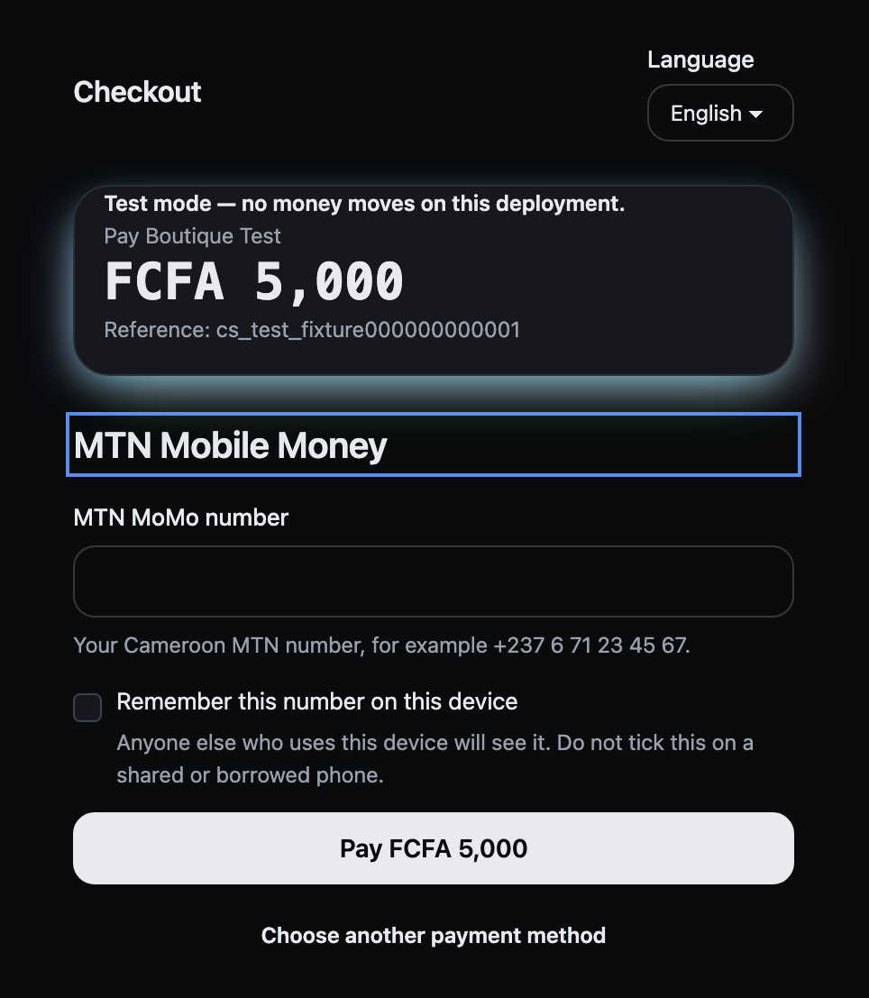 Checkout page in English: MTN MoMo number field with a Cameroon example, a remember-this-number checkbox with a shared-phone warning, and a Pay FCFA 5,000 button.